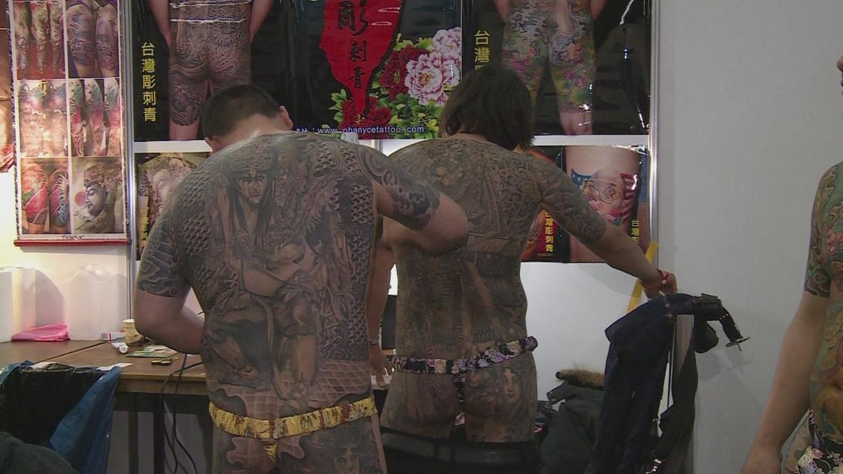 Germany: Tattoo artists show off their Asian ink