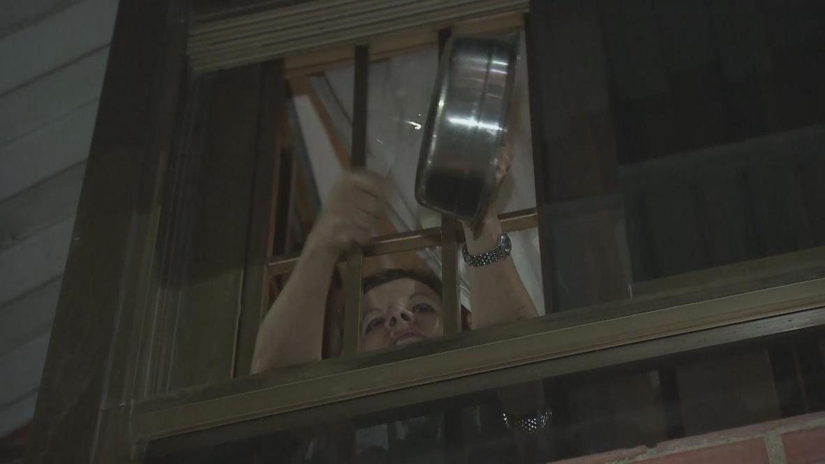 Venezuela: Pot-banging protestors and fireworks battle over Caracas