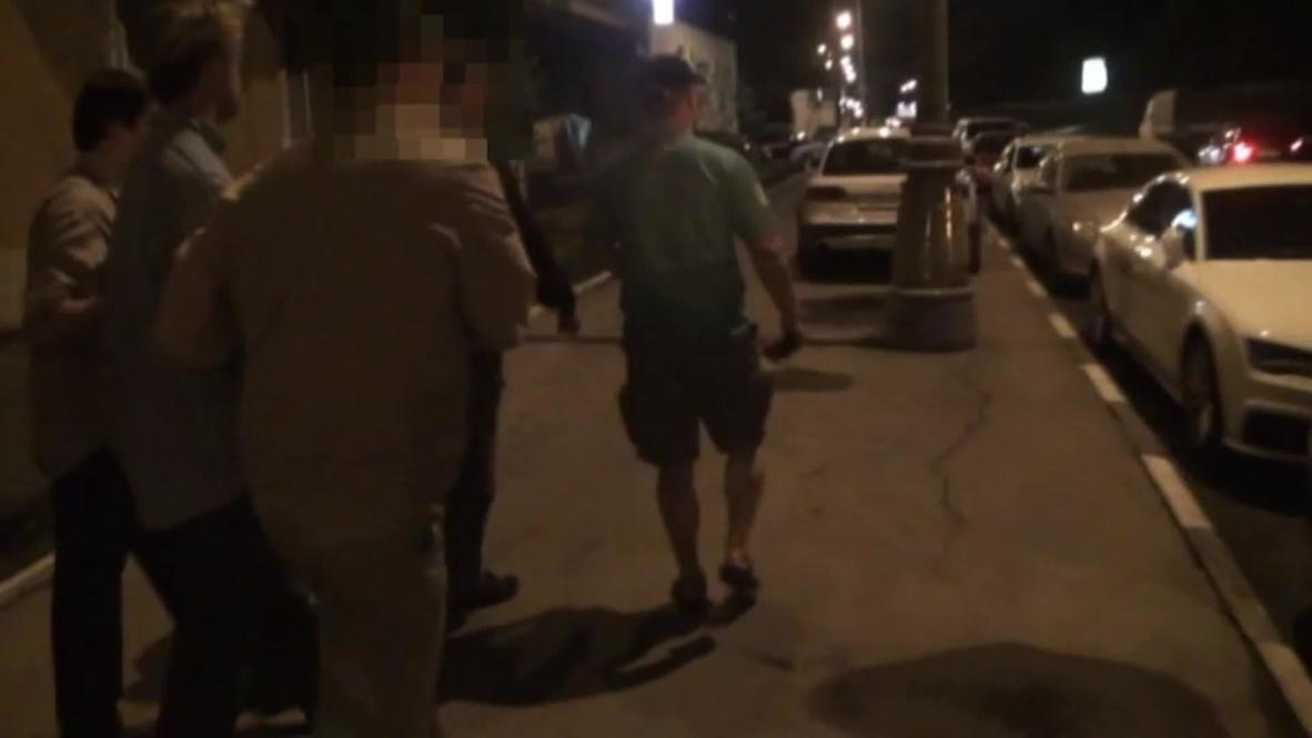 Russia: CIA men wear wigs and carry wads of Euro 500 bills?