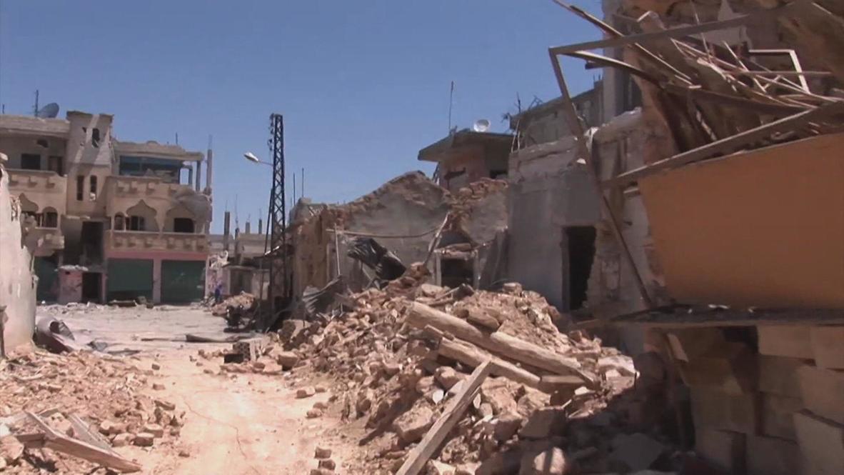 Syria: Qusayr littered with aftermath of battle