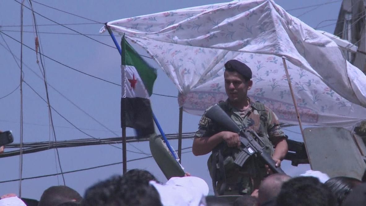 Lebanon: Protesters flee at sound of gunfire