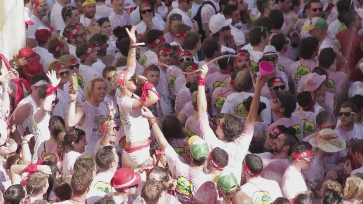Spain: Pamplona revels at pre bull-run party