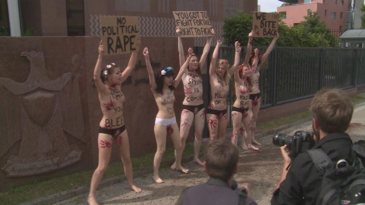Germany: 'Rape no more' cry bloodied femen