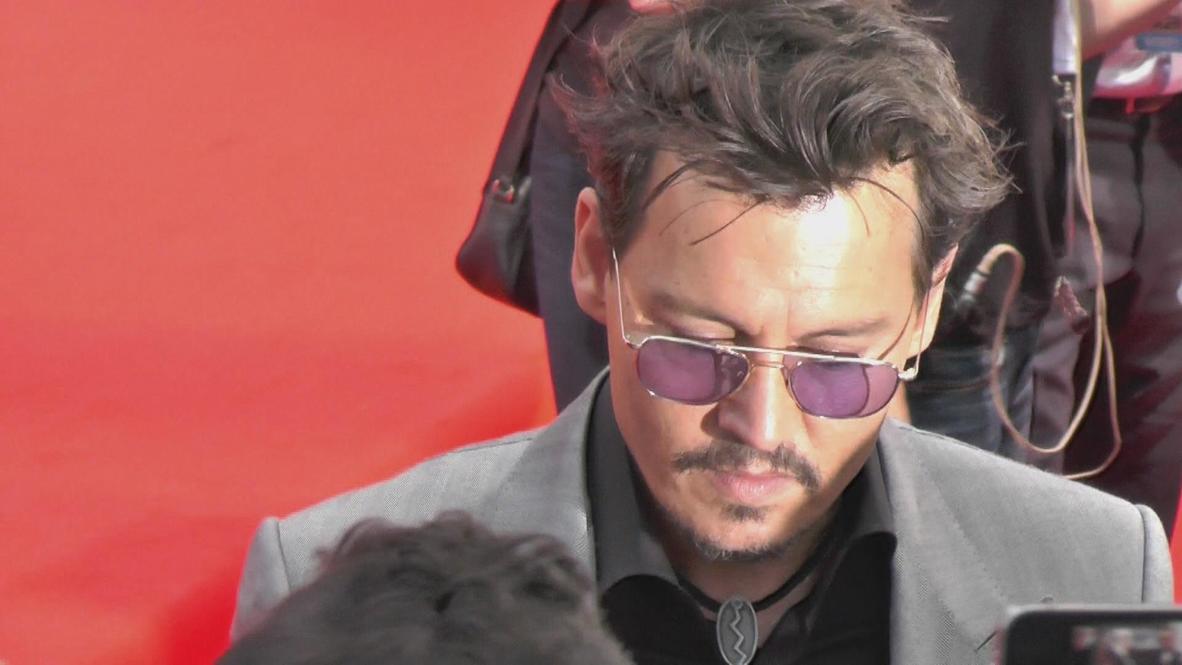 Germany: Johnny Depp under pressure at Berlin "Lone Ranger" premiere