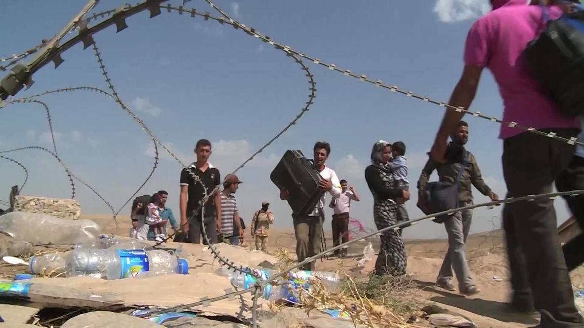 Iraq: Kurd refugees escape Syrian conflict