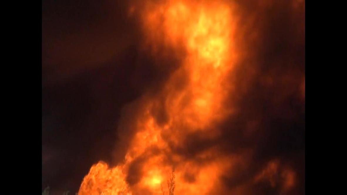 Russia: Man versus fire in massive petroleum plant blaze