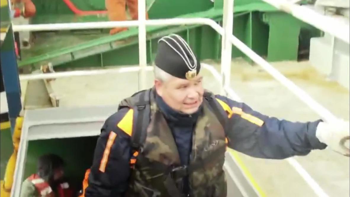 Russia: Sun sets on 'Arctic Sunrise' after coastguard threatens to open fire