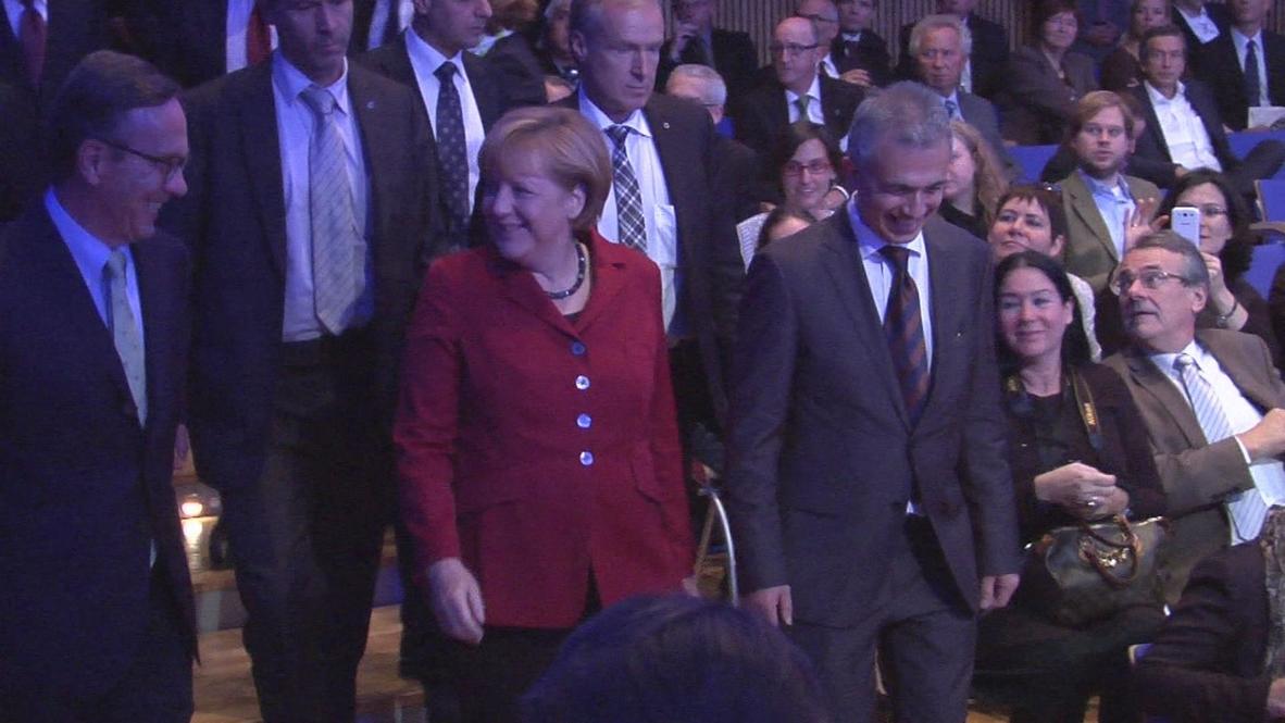 Germany: Merkel lauds German car manufacturing at IAA