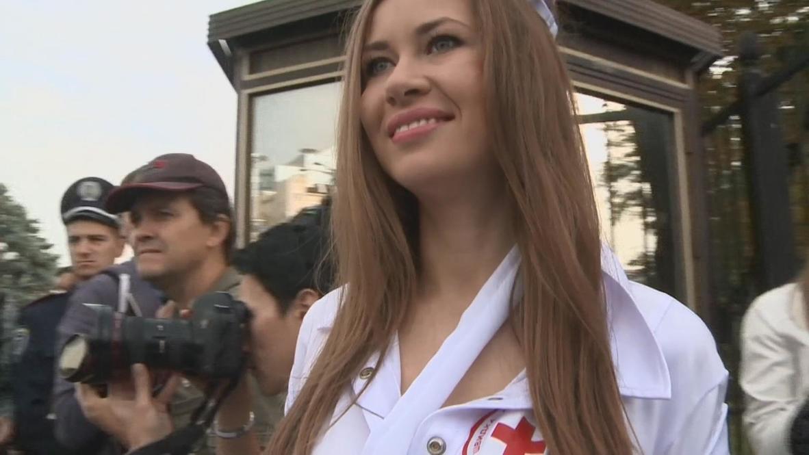 Ukraine: Comics play doctors and nurses to inject truth into parliament