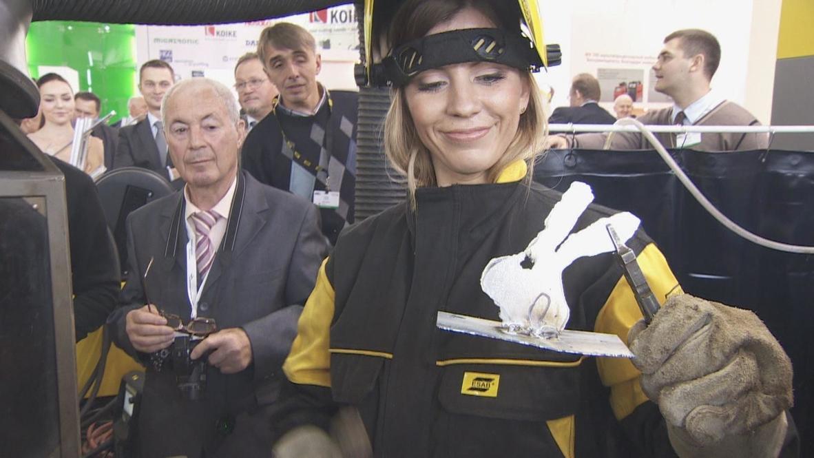 Russia: Miss Welding 2013 takes up the torch