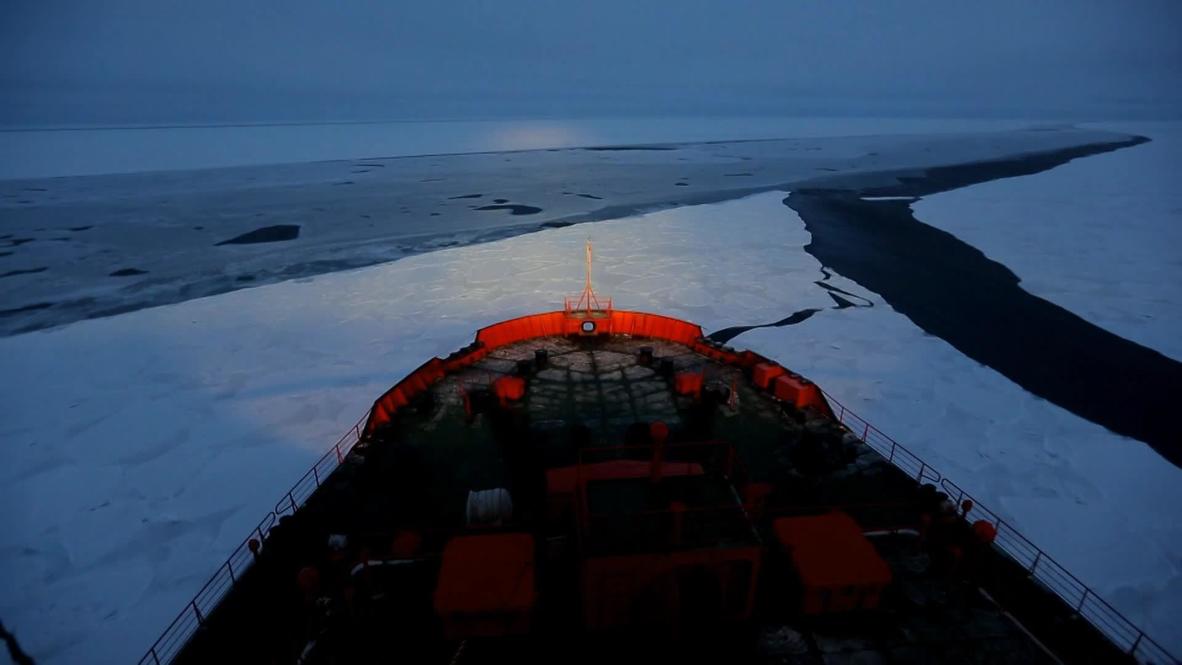 Arctic: A world-first - Olympic torch lit at North Pole