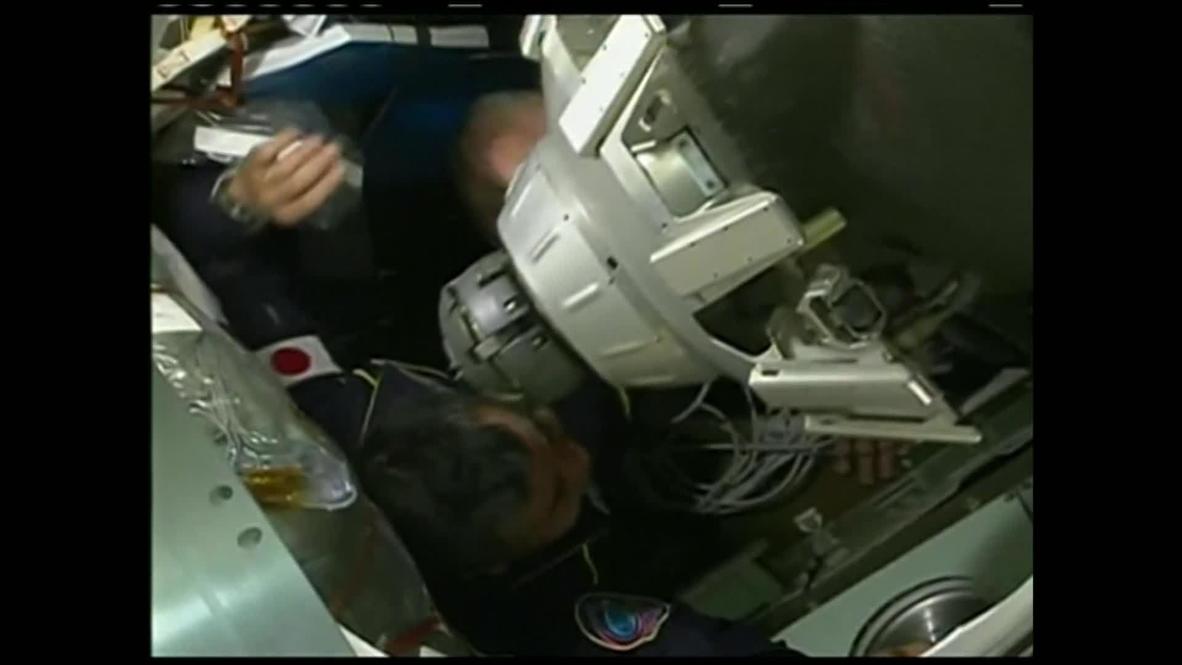 Space: Olympic torch arrives at the ISS