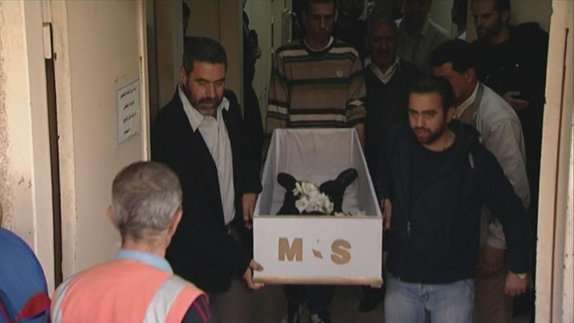 Syria: Christians mourn children killed in mortar attack *WARNING: GRAPHIC VIDEO*