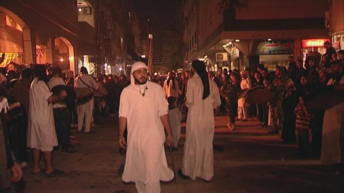 Syria: Torches light up Damascus suburbs for Ashura