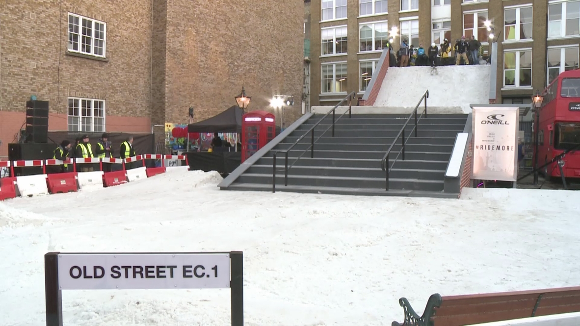UK: Snowboarders shred powder in central London