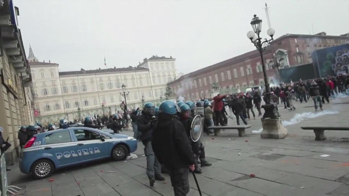 Italy: Clashes and teargas at tax cut protest in Turin