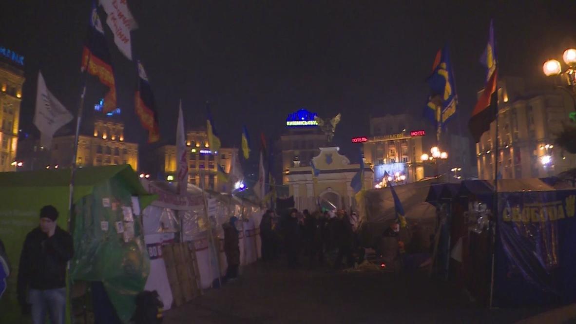 Ukraine: Protesters fight winter chill with dancing and porridge