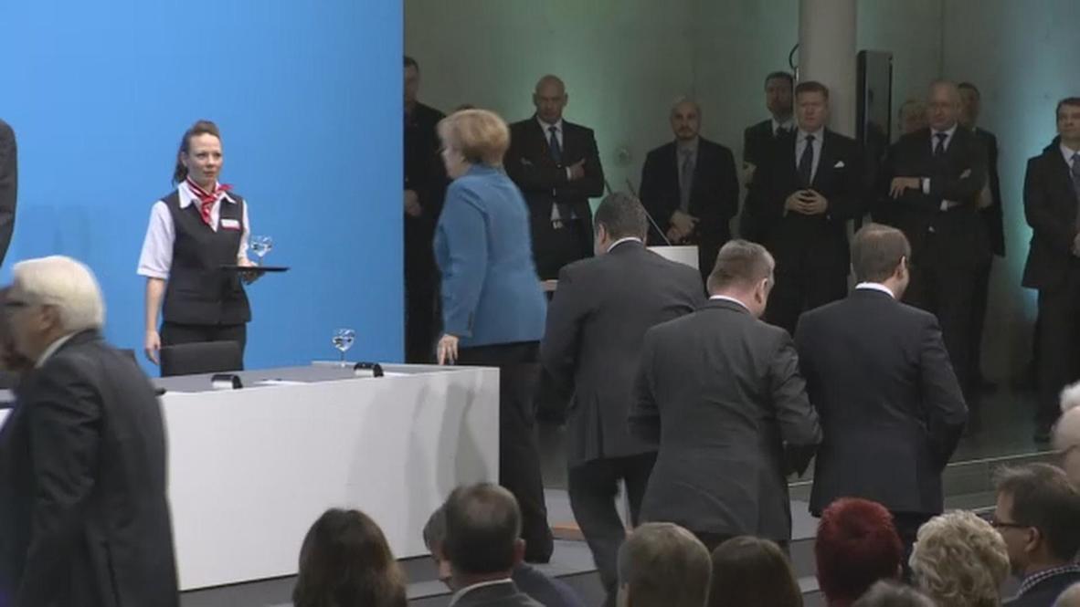 Germany: SPD signs with Merkel's CDU