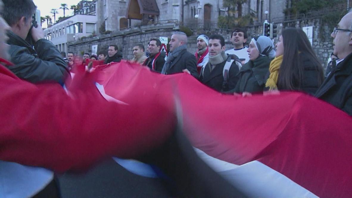 Switzerland: Protesters show support for Assad as Geneva II begins