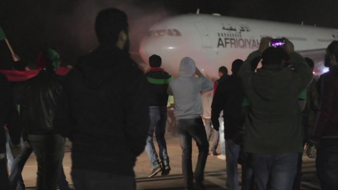 Libya: African cup champions get a raucous hero's welcome