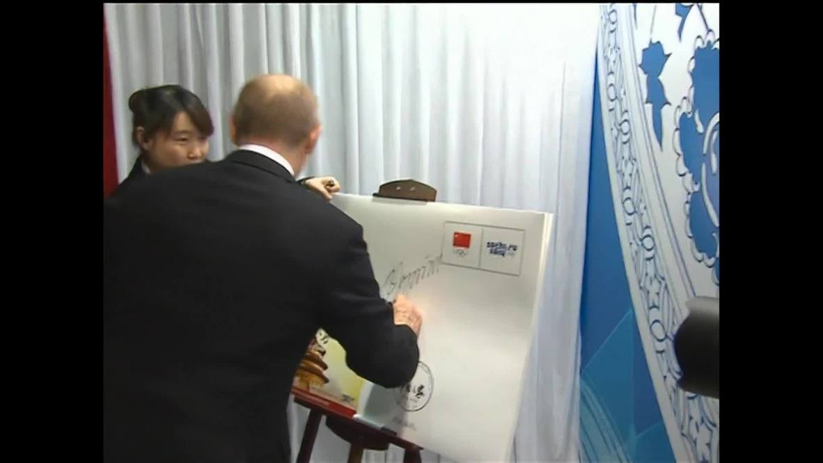 Russia: Putin greets the Chinese Olympic team