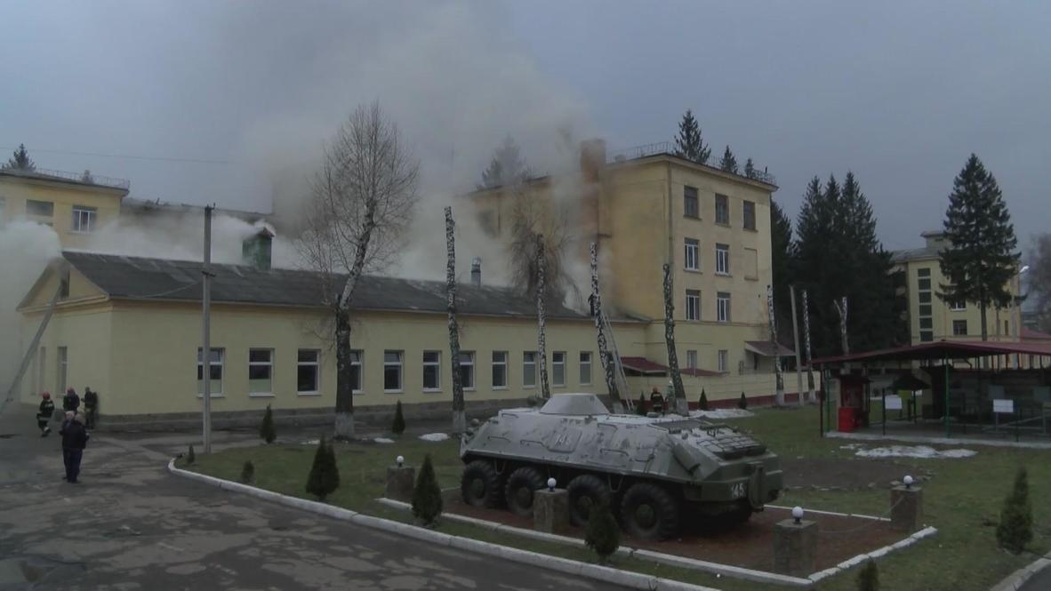 Ukraine: Military base set alight by protesters smoulders