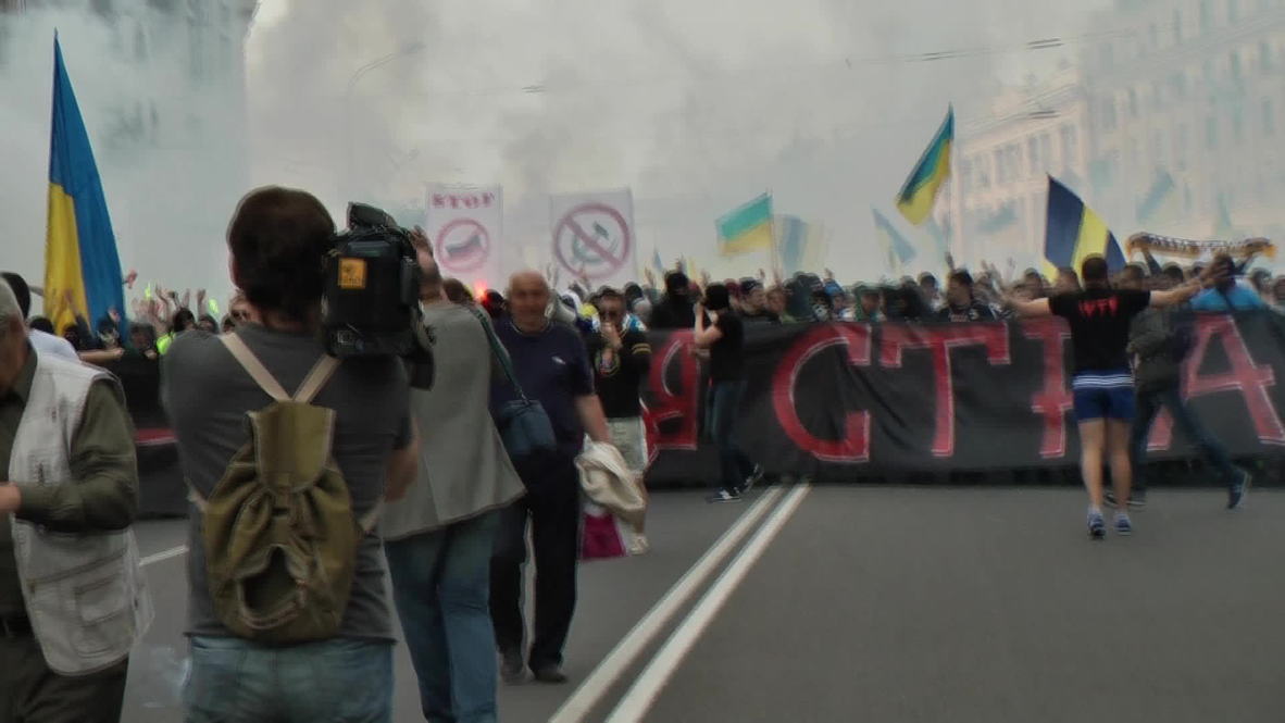 Ukraine: 14 injured as football fans clash with pro-Russia protesters