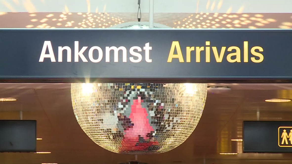 Denmark: Eurovision fans mob Copenhagen airport