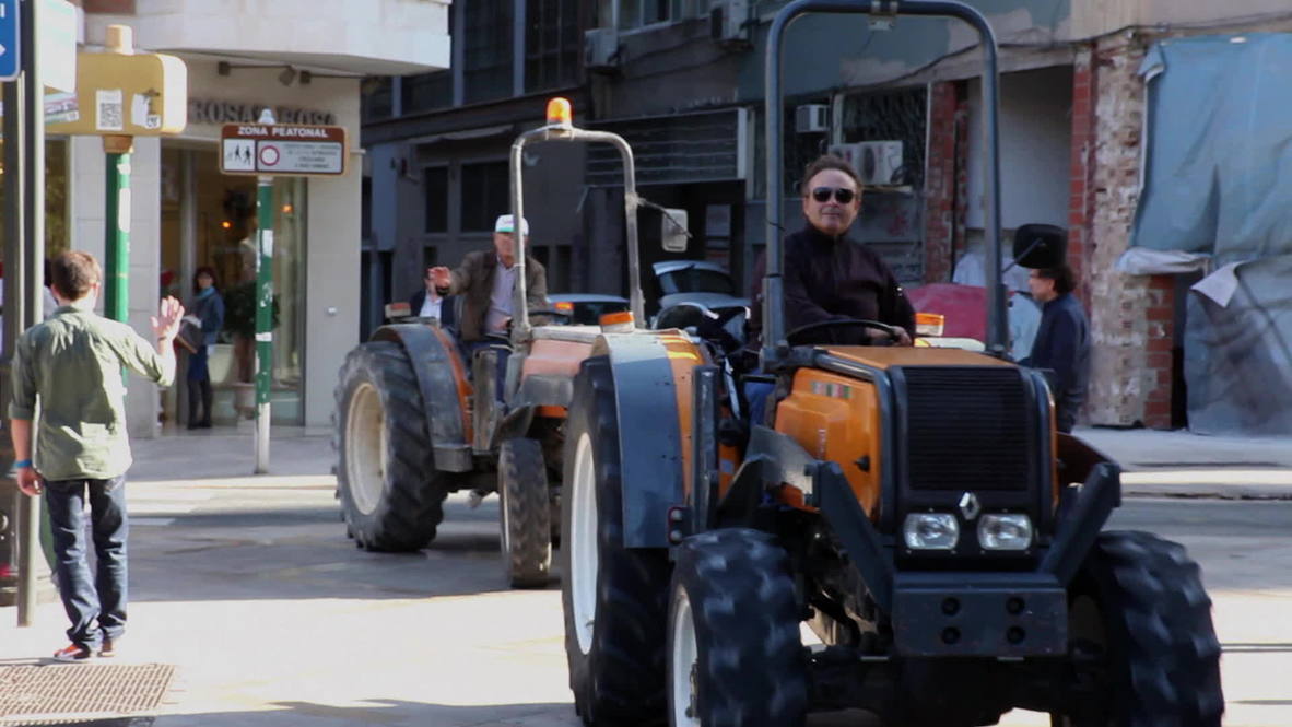 Spain: Dancing tractor concert roars to life