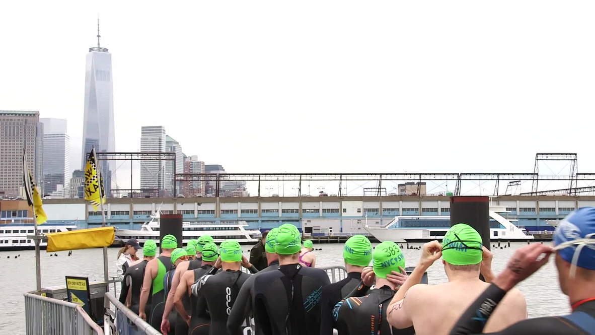 USA: NYC swimmers embrace the cold in Hudson River race