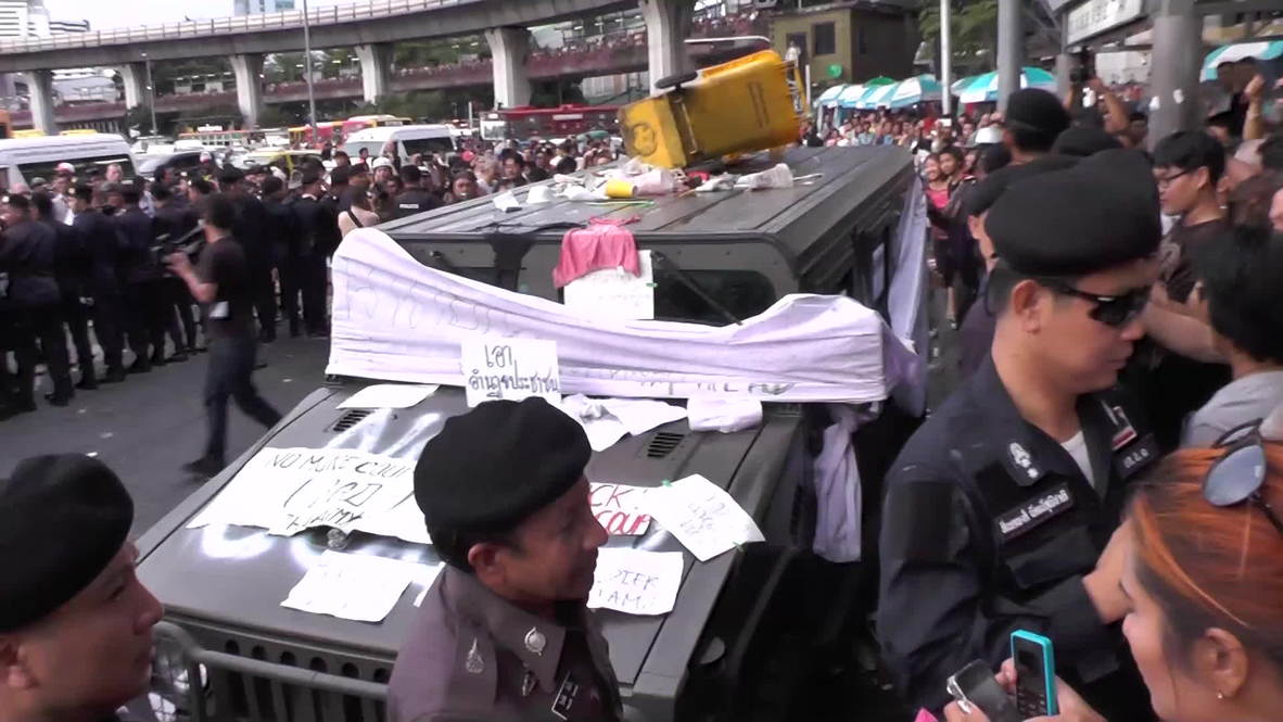 Thailand: Anti-coup protesters deface Army Humvee