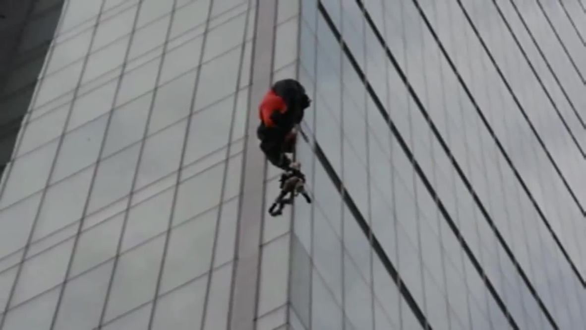 Turkey: Daredevil parachutist stranded on Turkey's tallest building
