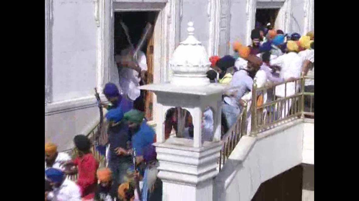 India: Sword wielding Sikhs clash inside Golden Temple