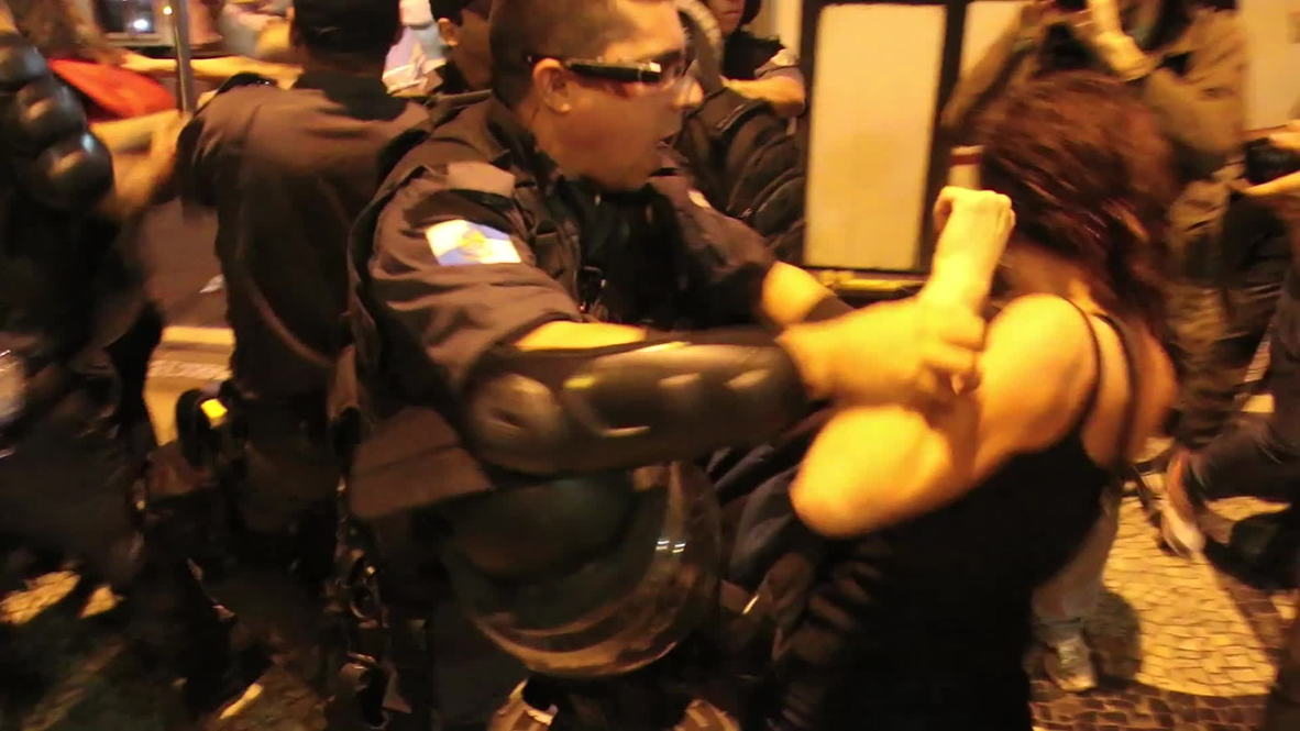 Brazil: Riot police clash with free fare protesters after bus raid