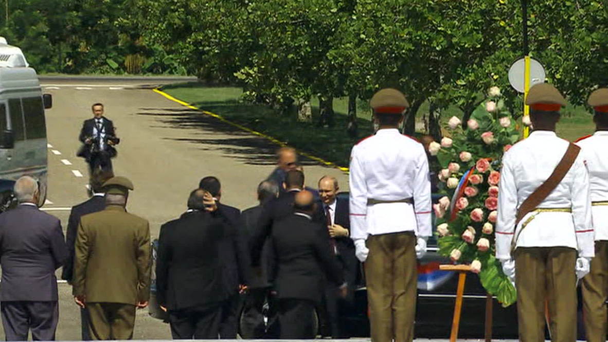 Cuba: Putin and Raul Castro pay respects at Soviet memorial