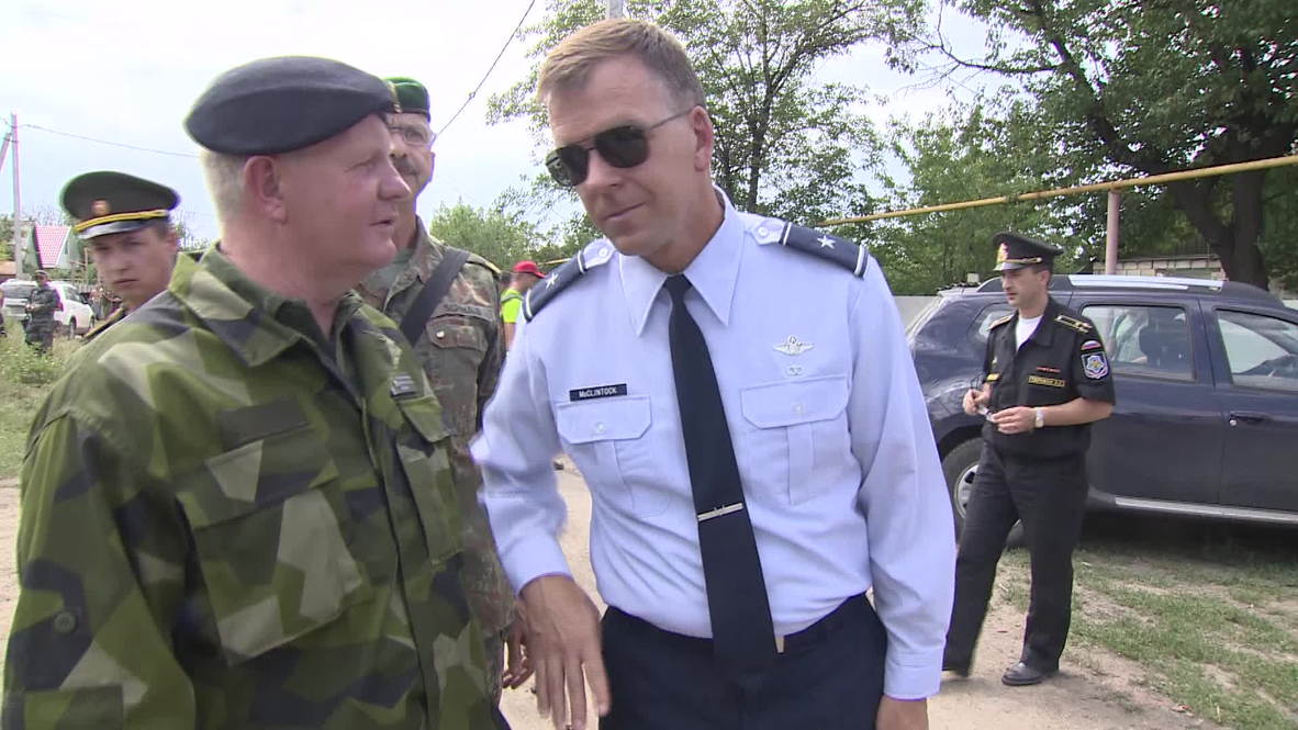Russia: US inspector confronted by fleeing Ukrainian at Russian border