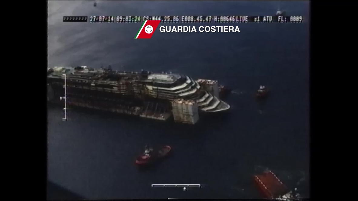 Italy: Crippled Costa Concordia completes final voyage - POOL