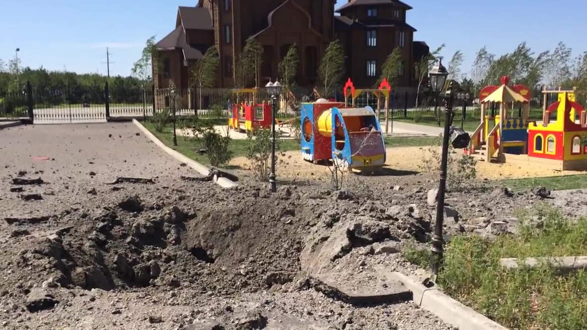 Ukraine: See massive bomb crater by kids' playground