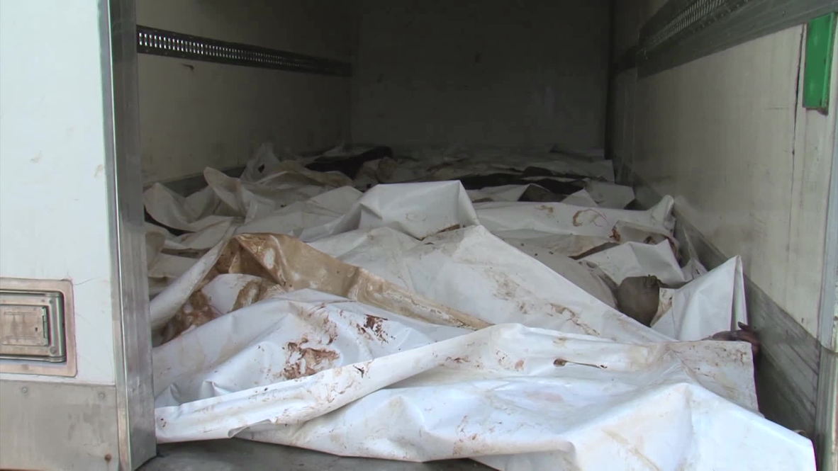 Libya: Relatives forced to identify bodies after violent clashes *GRAPHIC*