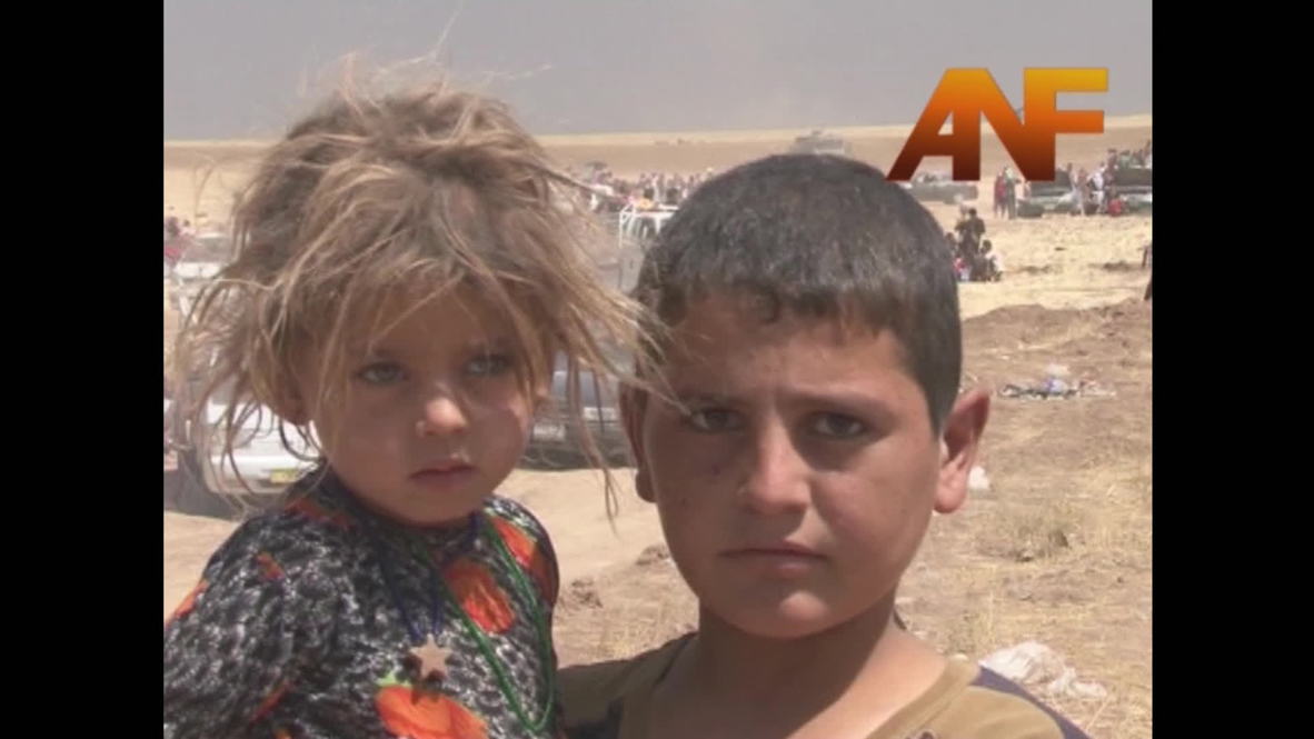 Iraq: Yezidis flee to safety from Sinjar *POOL*