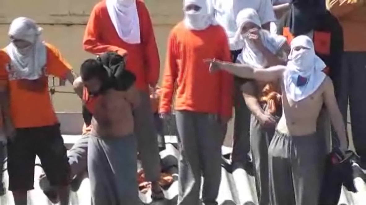 Brazil: Two beheaded, one pushed off roof in prison uprising *POOL*