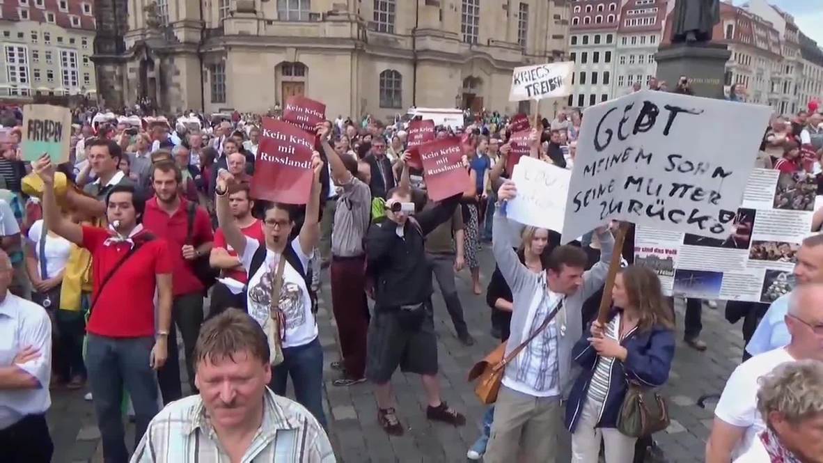 Germany: Anti-Merkel protesters oppose war with Russia