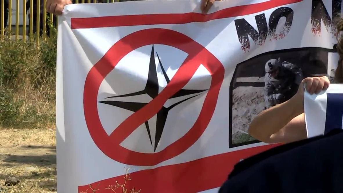 Georgia: Anti-NATO protesters stand off against vast police cordon