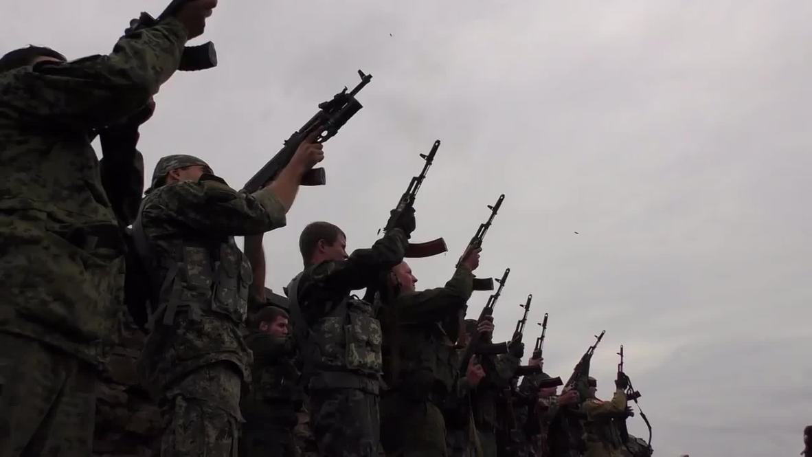 Ukraine: DPR militia fire live rounds to mourn fallen fighters