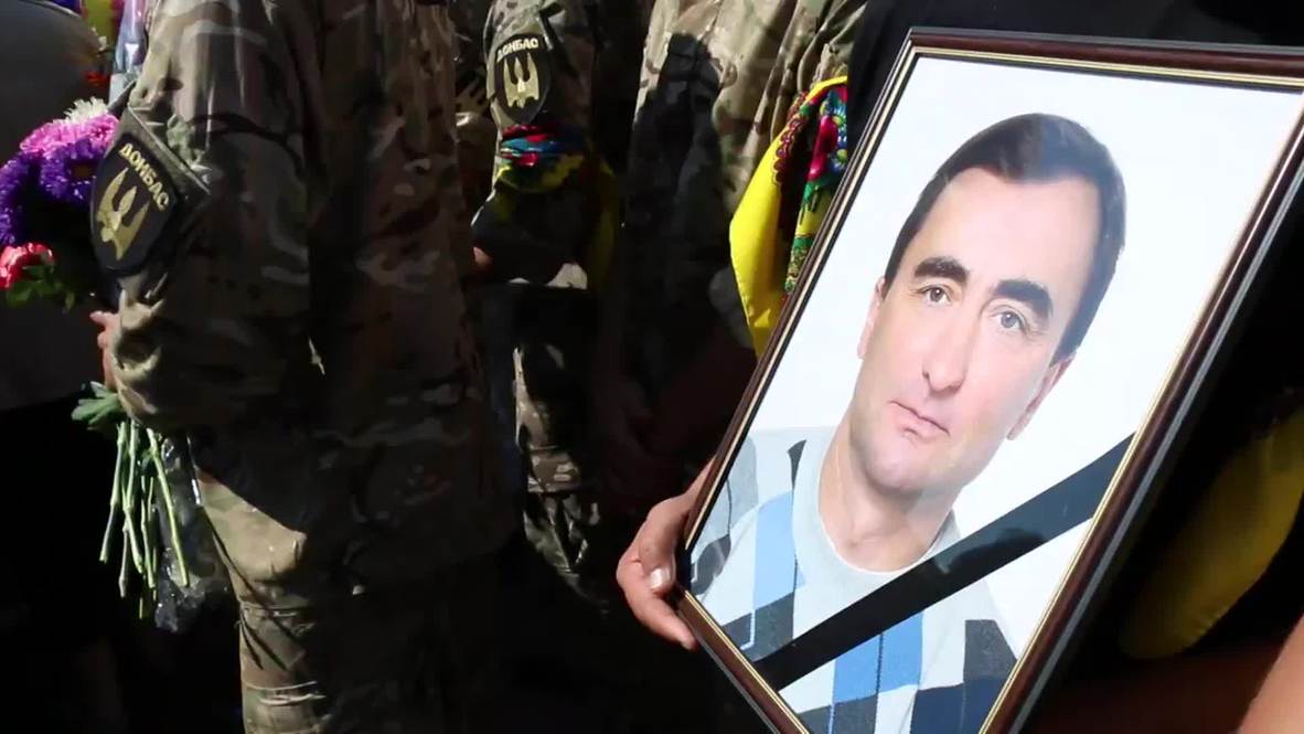 Ukraine: Mourners pay their respects to Donbass battalion gunner
