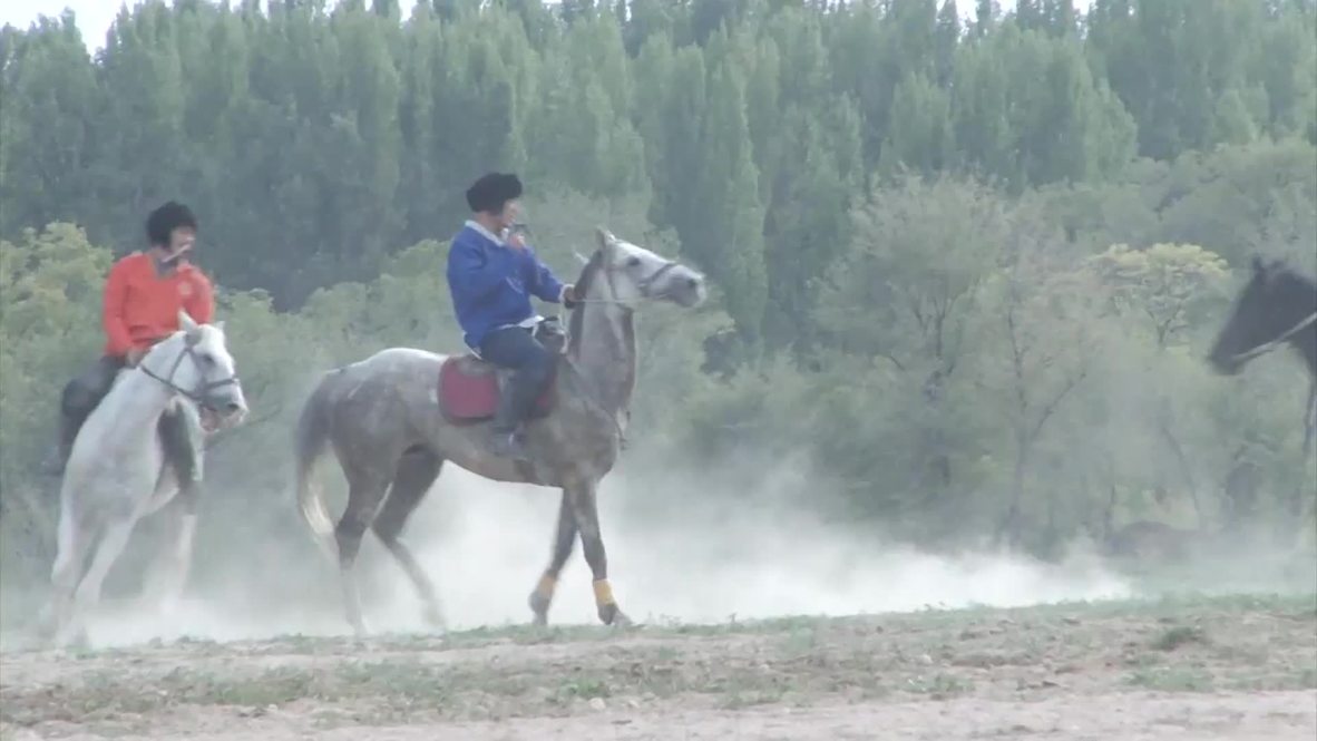 Kyrgyzstan: See mounted men drag goat carcass in World Nomad Games