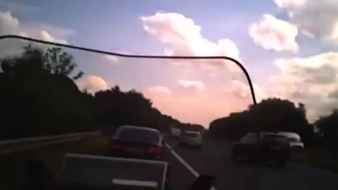 UK: Watch as criminal smashes into police in high speed chase