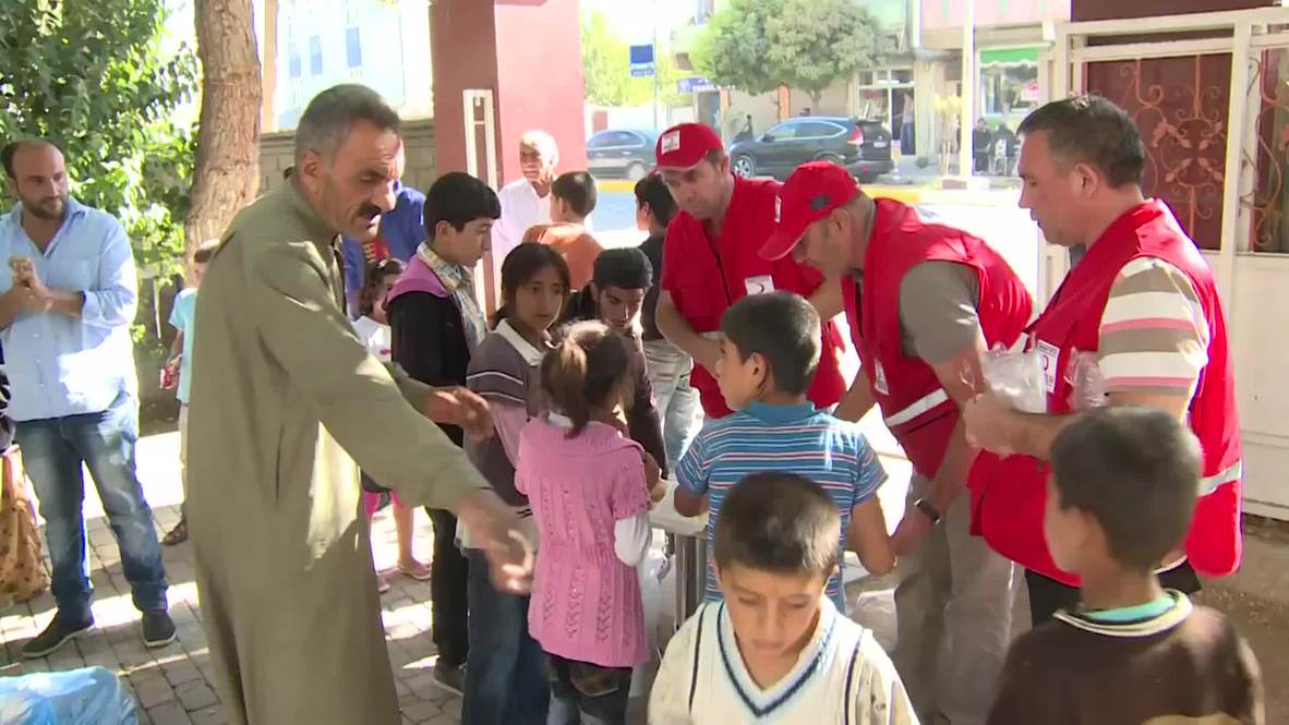 Turkey: Syrian Kurds take refuge in Suruc as IS offensive rages on