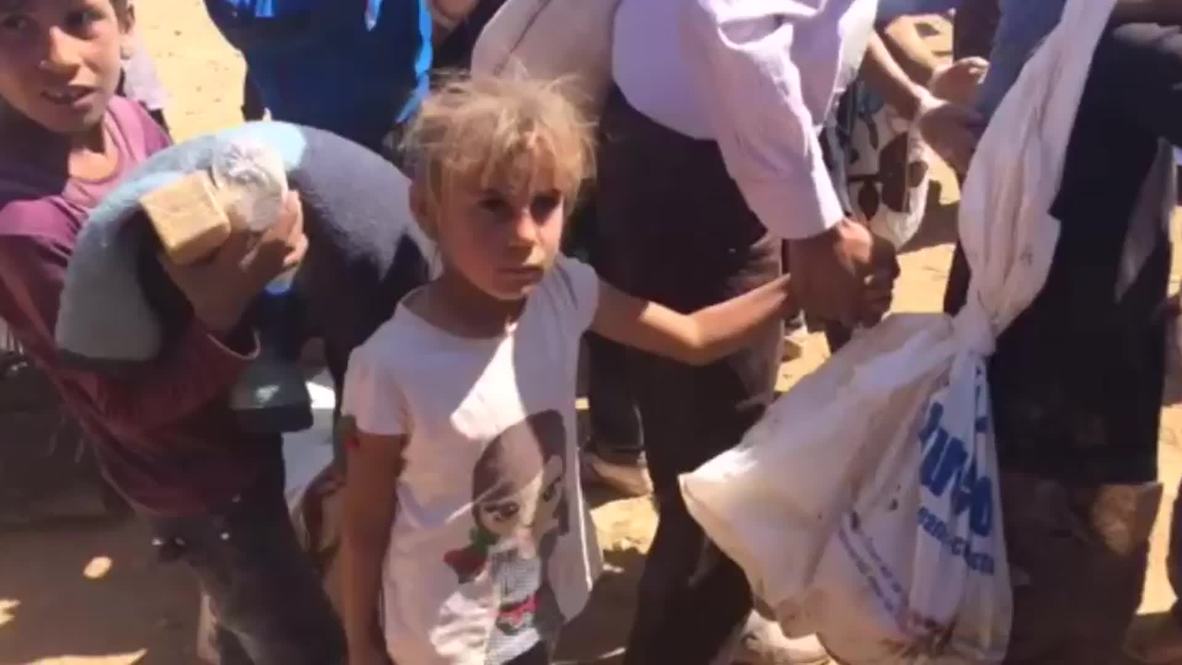 Turkey: Kurdish children flee U.S airstrikes on Syria