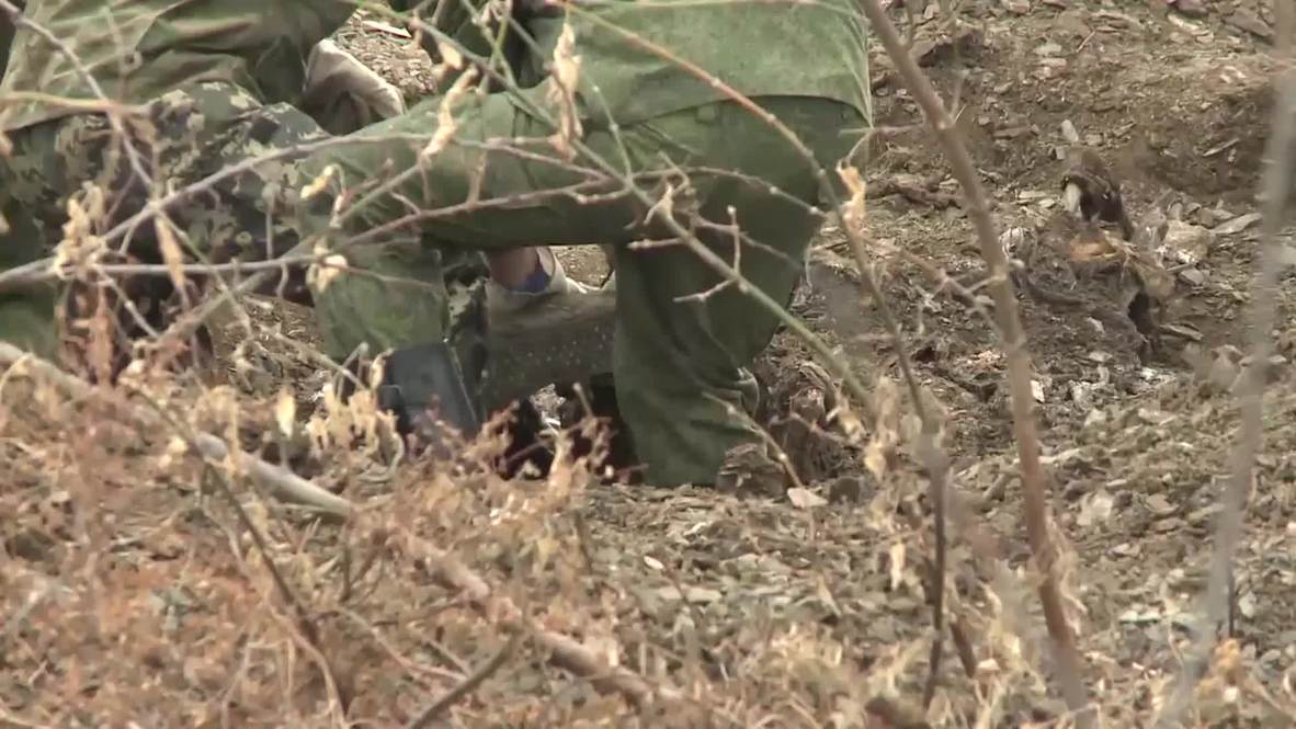 Ukraine: Mass grave of fresh corpses found in Donetsk *VERY GRAPHIC*